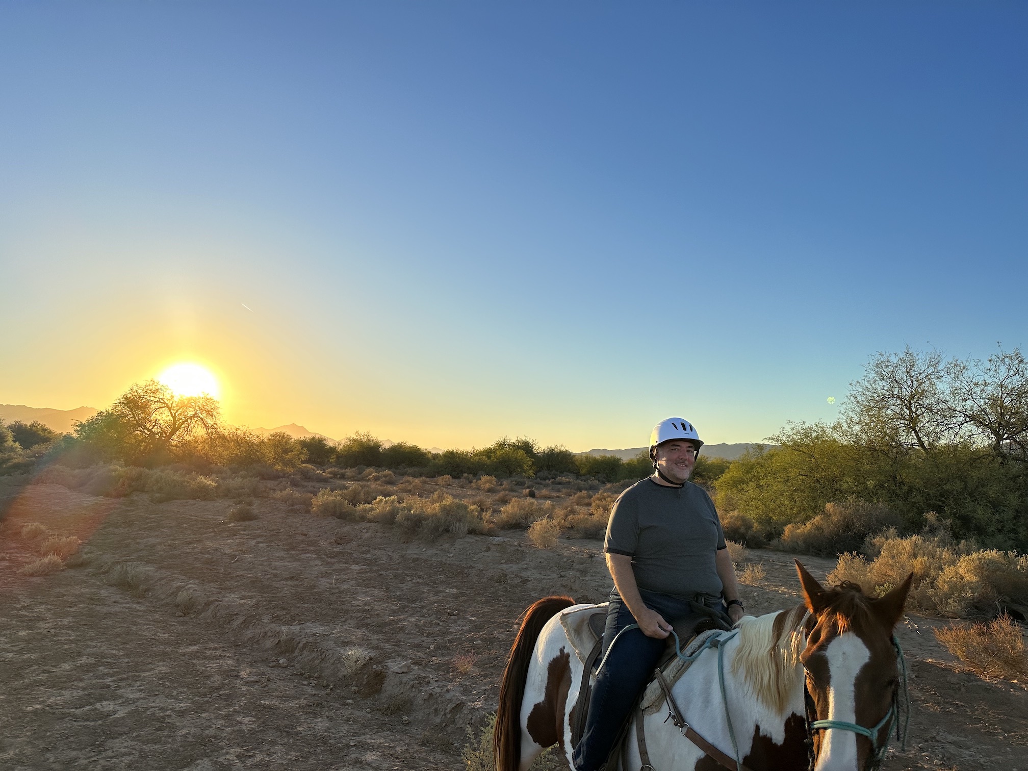 Keith on a horse in the Arizona desert.